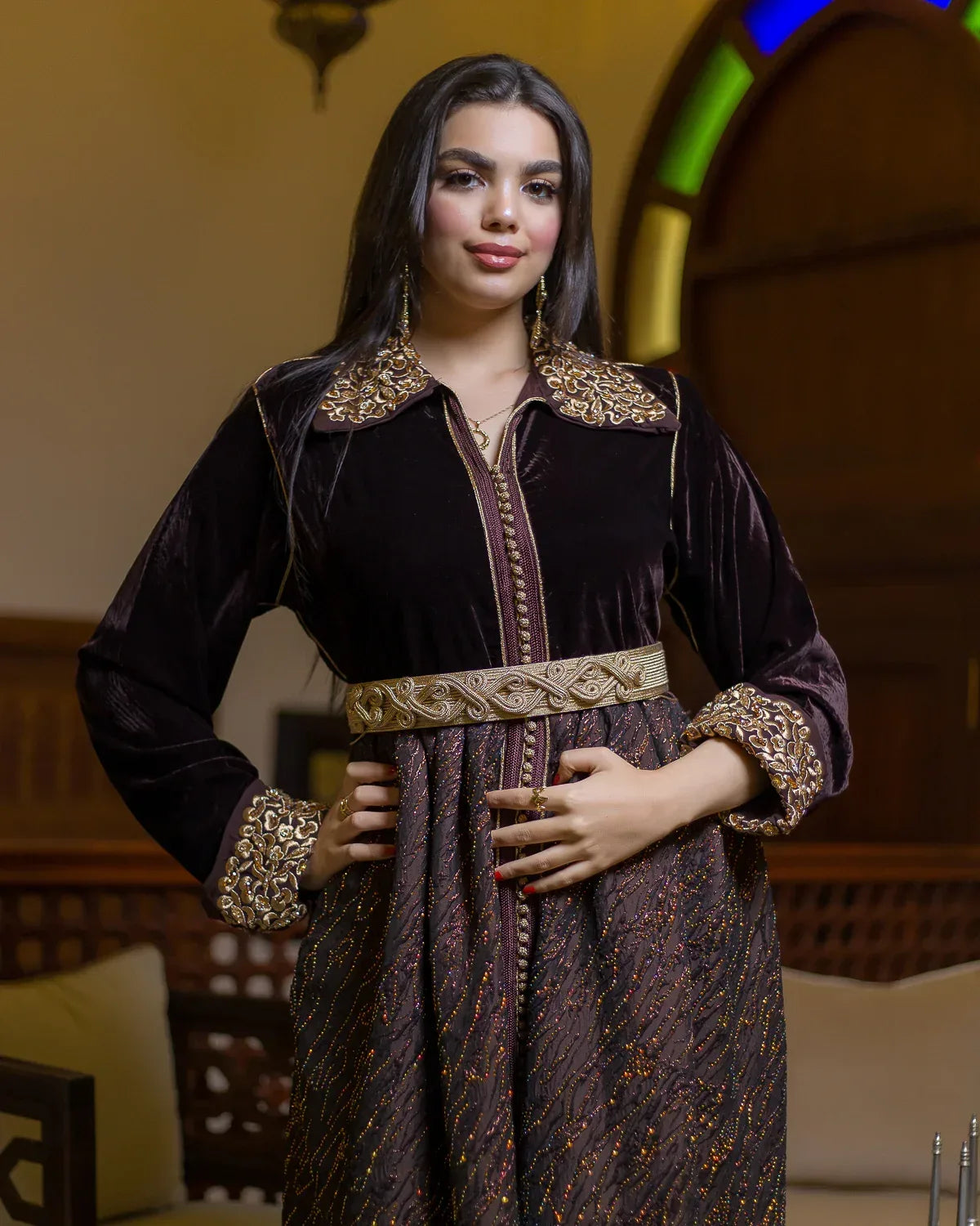 Three-quarter view of the GAZAL Rabati style brown velvet caftan with gold details.