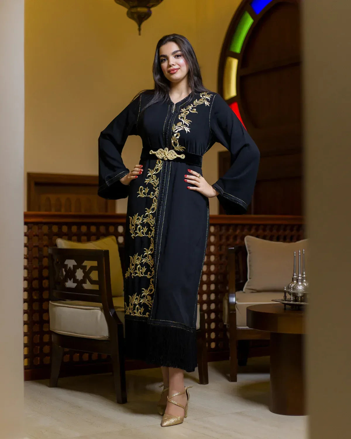 Full body standing pose in the LAHN modern black Moroccan evening caftan dress