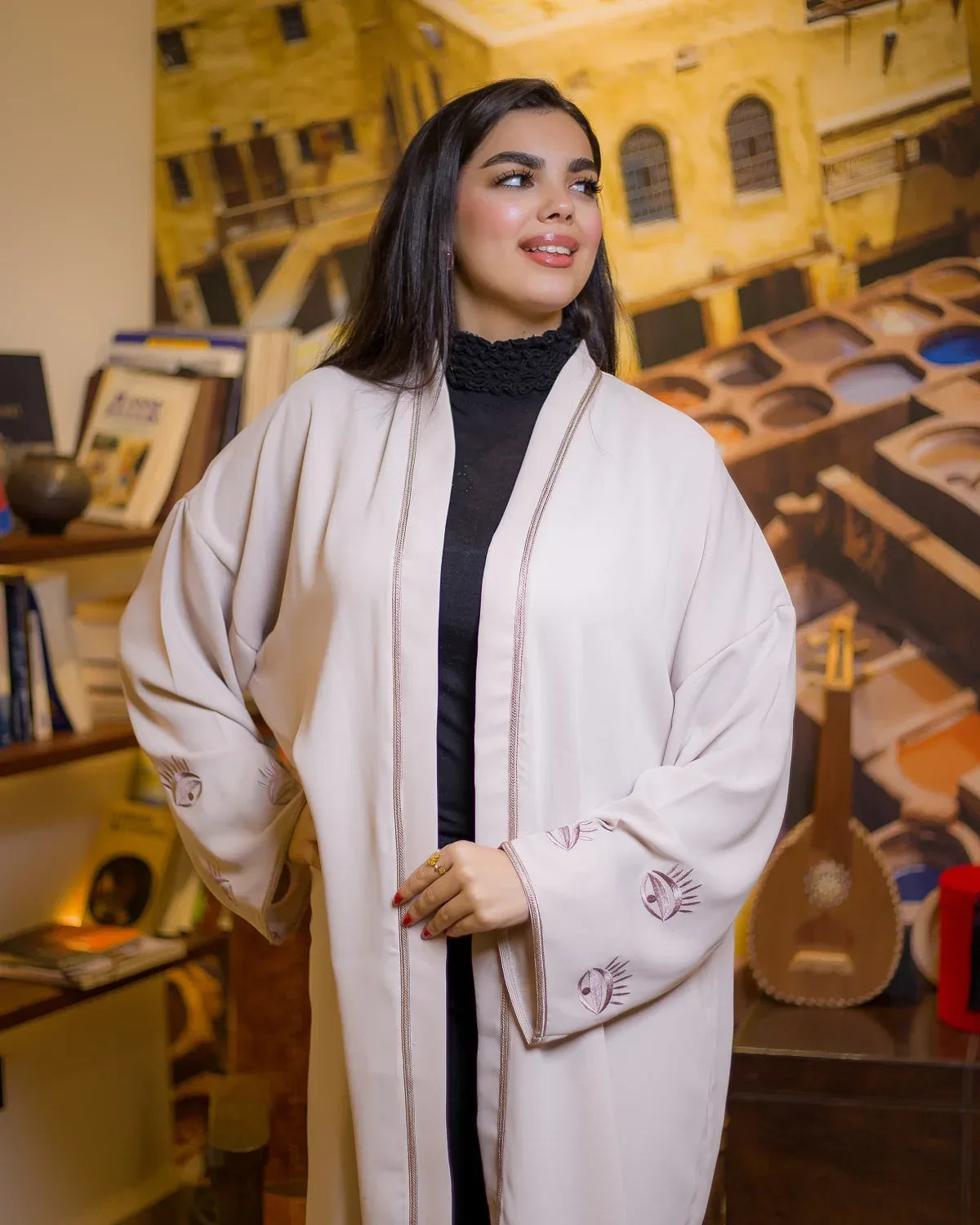 Close-up of WATAR Harmony kimono collar and premium silk stitching on a beige contemporary design.
